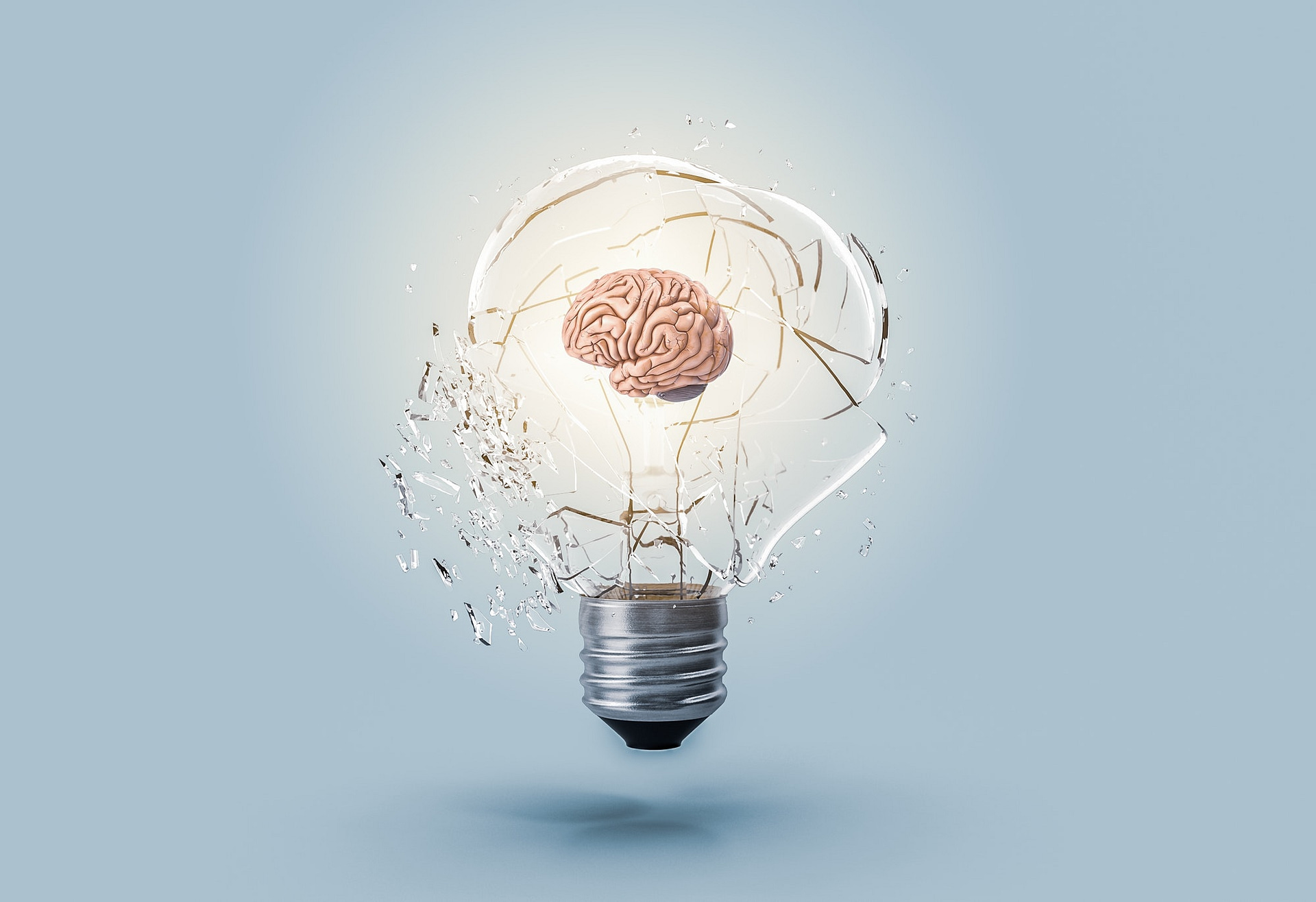 Image of breaking lightbulb with brain depicting ideas, something mindblowing